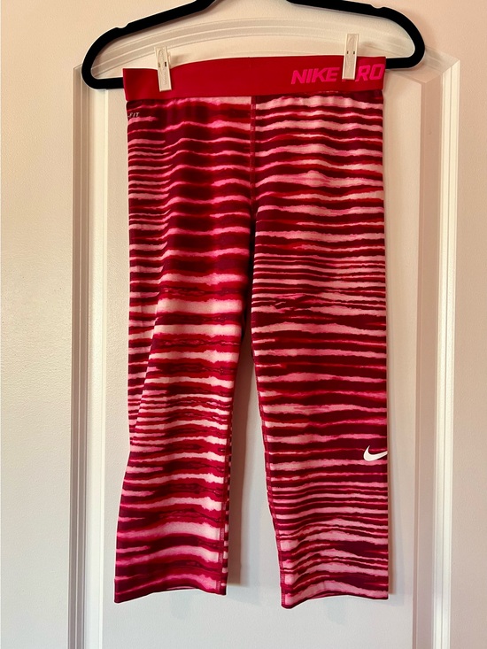 Nike Pants - Nike Pink and Red Striped Women’s Capri Leggings